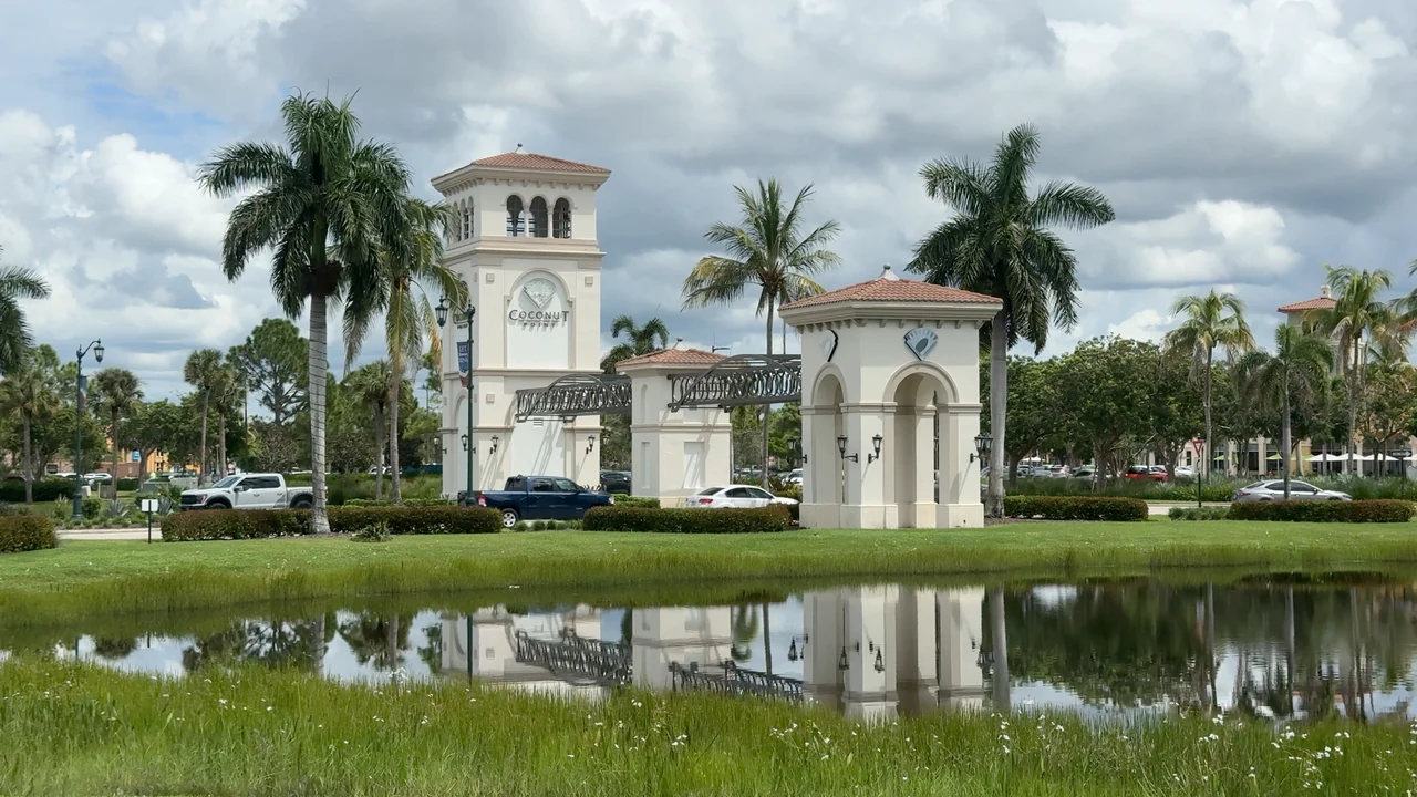 Coconut Point entrance and palm trees in Estero, Florida